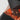 Surveying Equipment Metricop LLC Leica Style GRZ122M 360° prism with orange reflective facets and black textured casing.